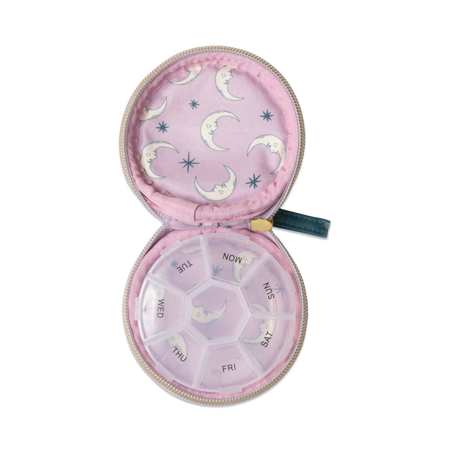 Pill organizer with moon and star pattern on a white background