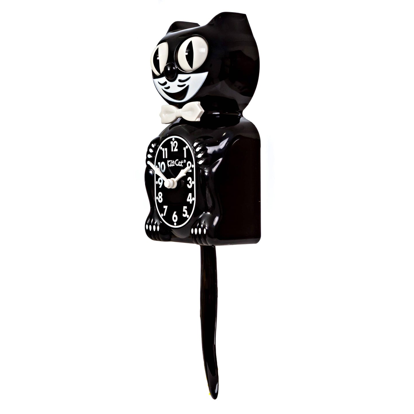 Black cat-shaped clock with white face on a white background in 3/4 view