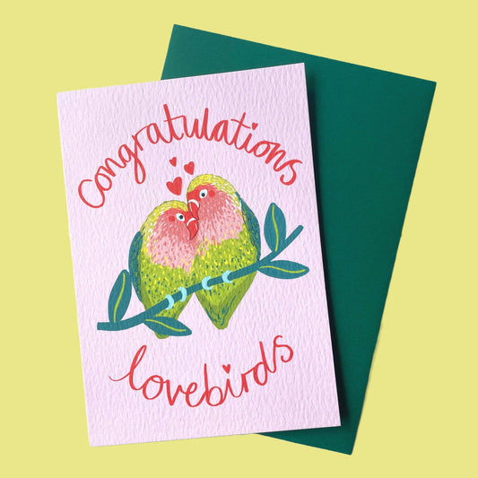 Greeting card with lovebirds illustration and 'Congratulations lovebirds' text on a green background