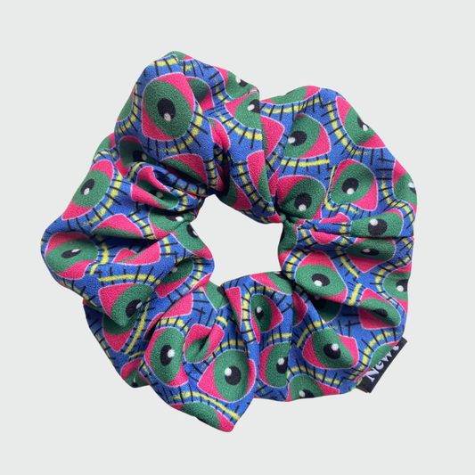 Colorful patterned scrunchie on a light  background