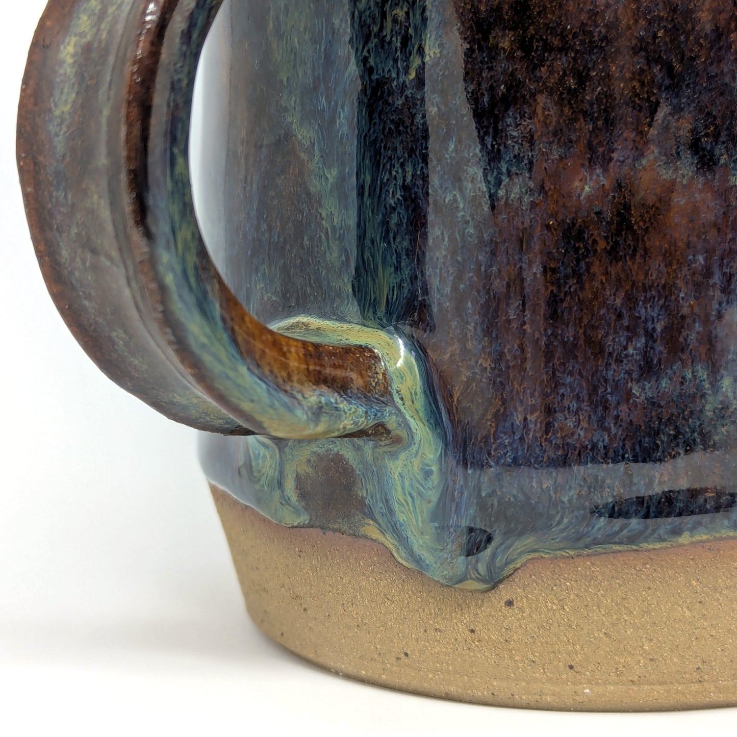 Close up of glaze detail on mug handle