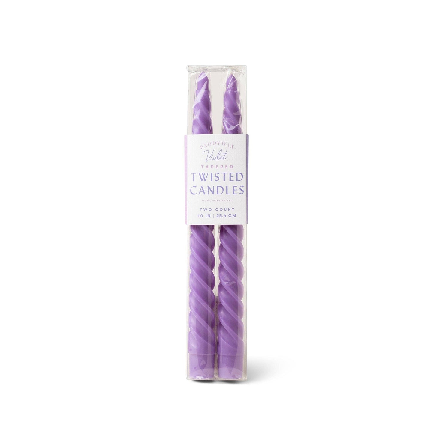 Purple twisted candles in packaging on a white background