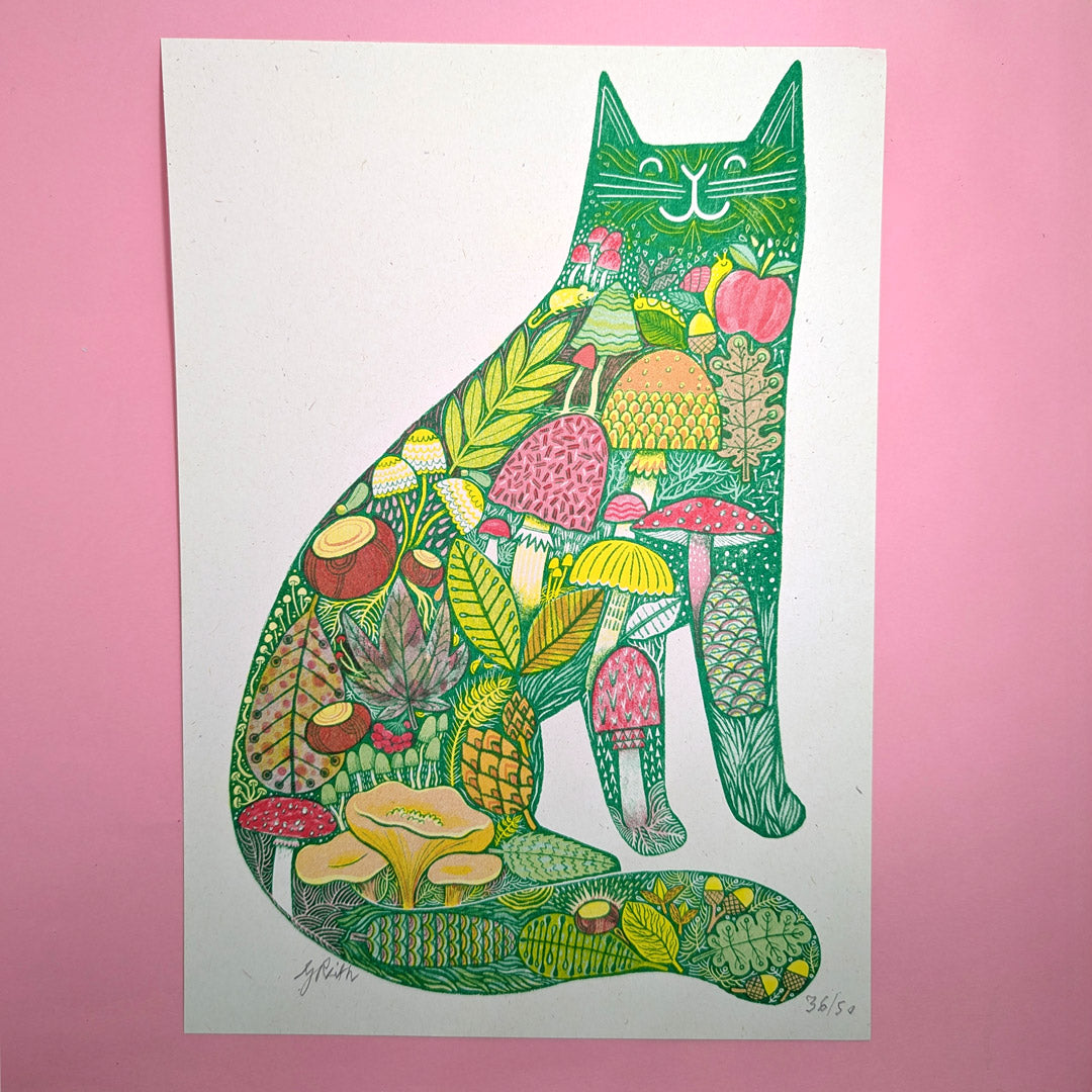 Colorful illustration of a cat made from natural elements on a pink background