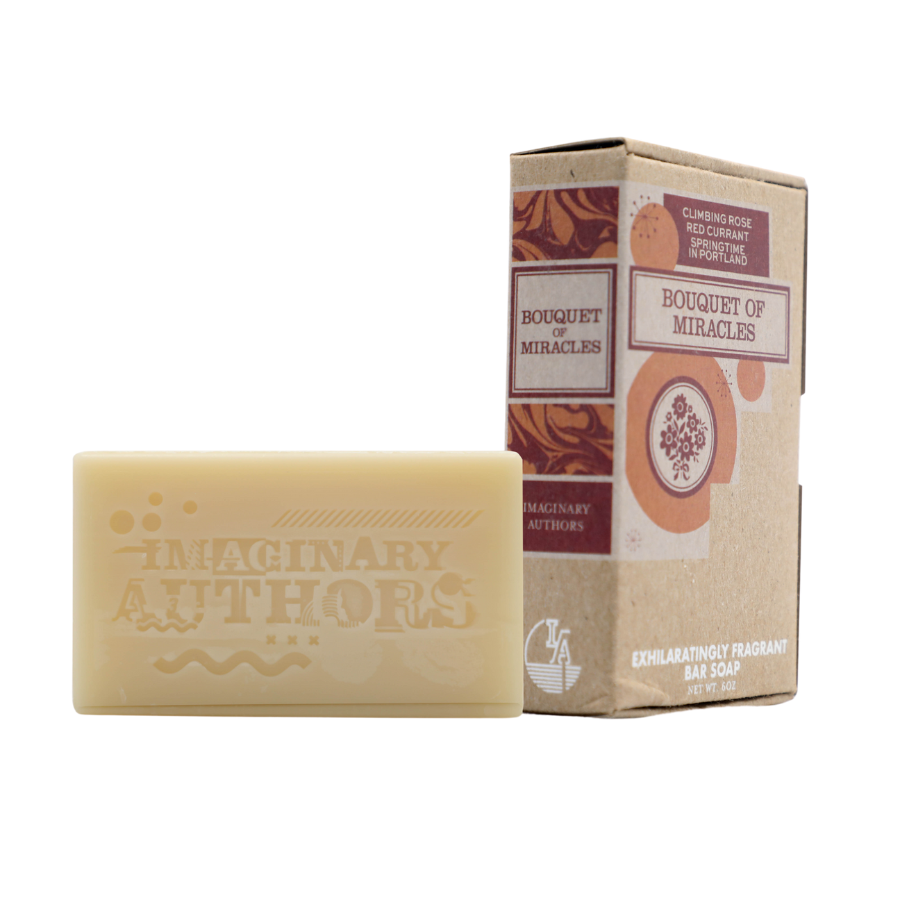 Bar of soap with 'Imaginary Authors' branding next to its packaging on a white background