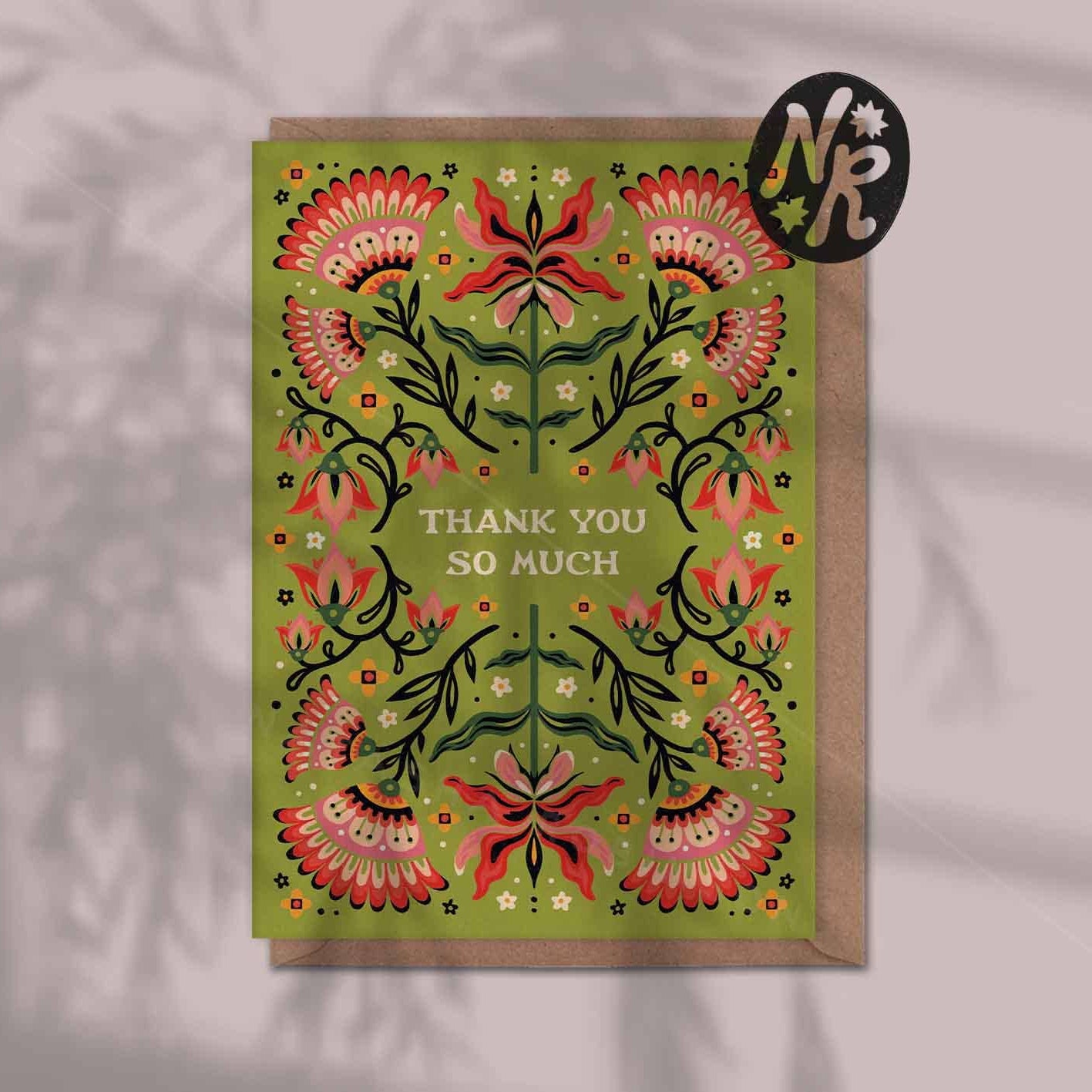 Decorative card with floral design and 'Thank you so much' text on a green background