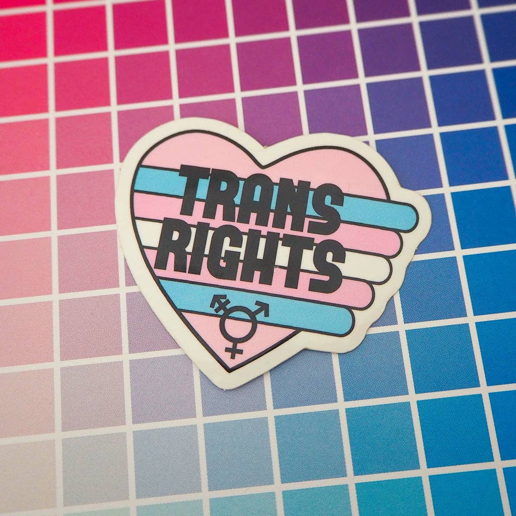 Vinyl sticker in a heart shape with 'Trans Rights' written on it