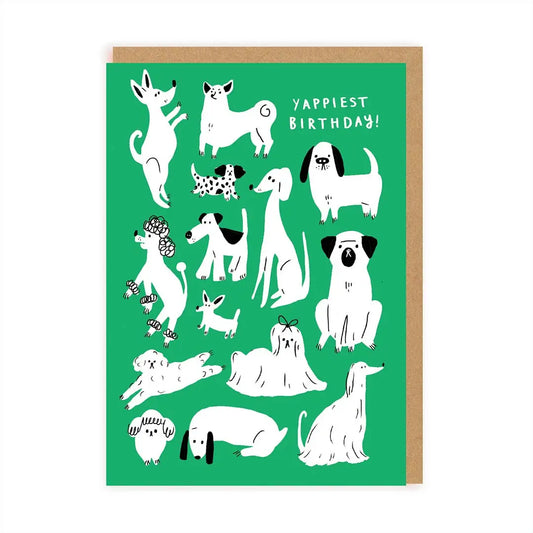 A greeting card with various illustrations of dogs and the text 'Yappiest Birthday!' on the front.