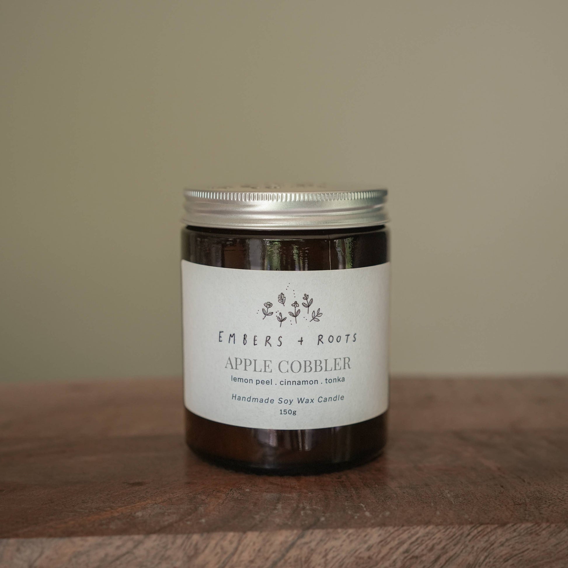Apple Cobbler scented  vegan candle in a glass jar with lid.