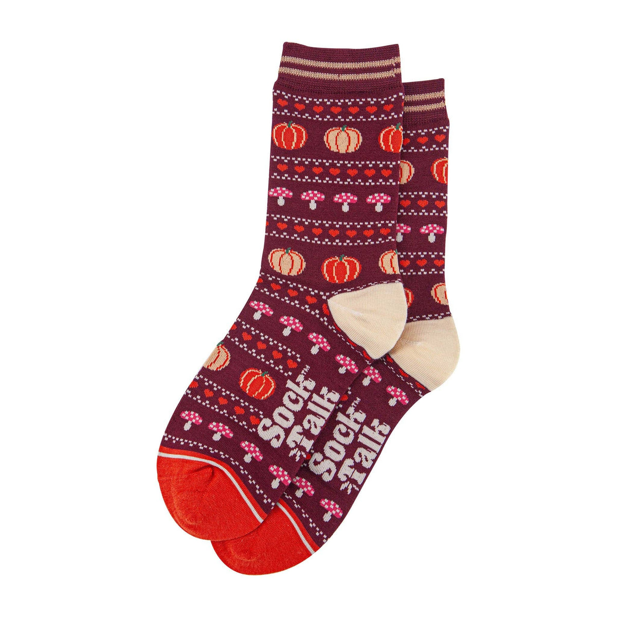 Pair of burgundy socks with autumn-themed pattern sitting on a white background
