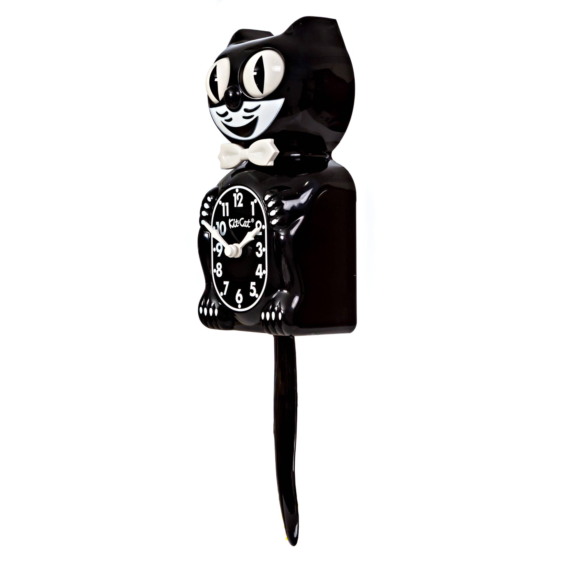 Black cat-shaped clock with white face on a white background in 3/4 view
