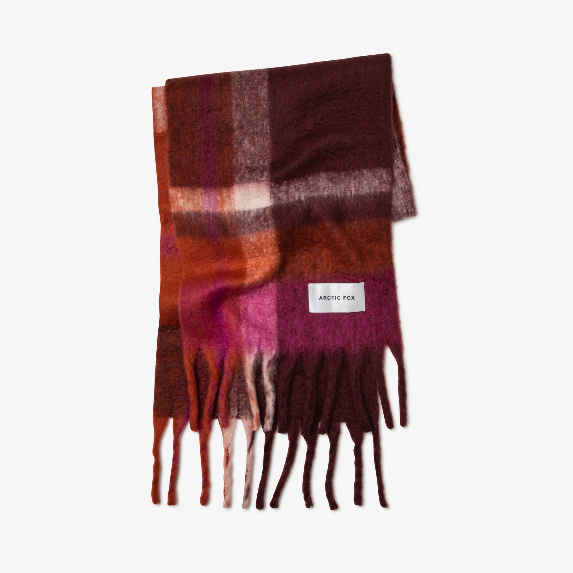 Plaid scarf with fringes on a white background