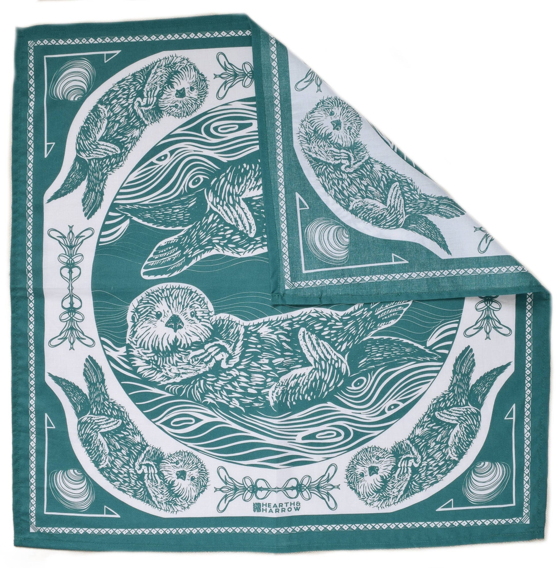 Teal scarf with white otter pattern on a white background