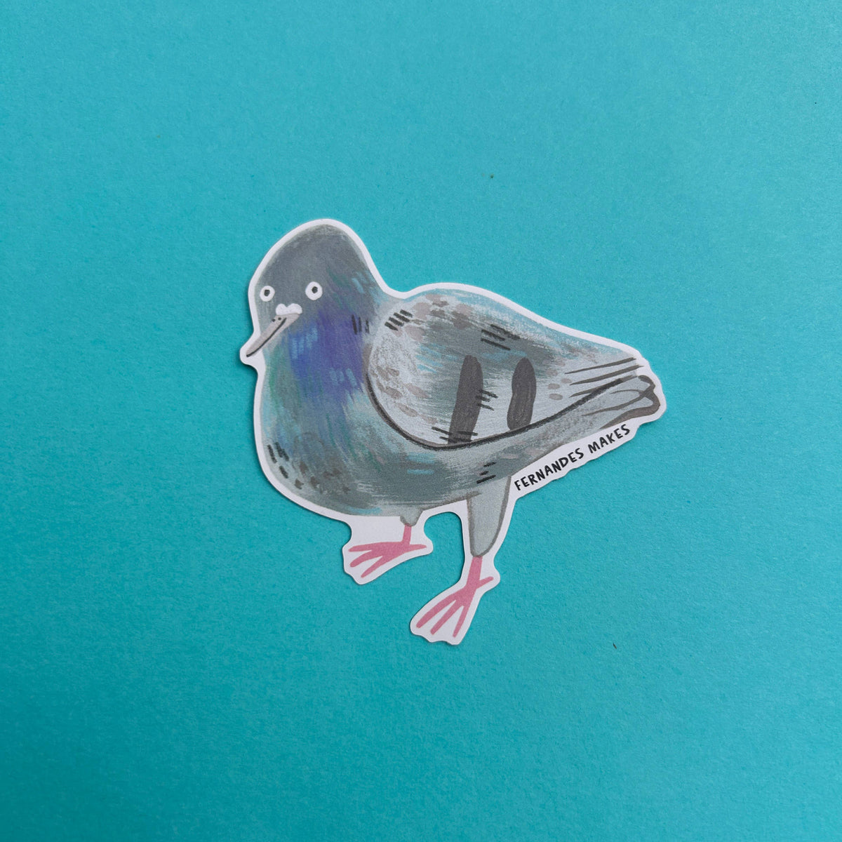Sticker of a pigeon on a teal background