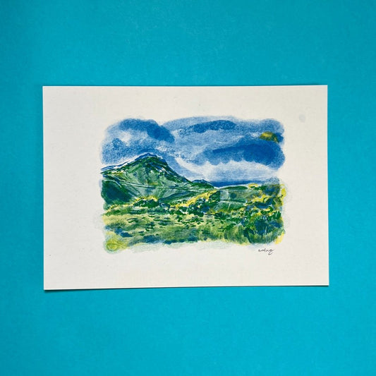Blue and green illustration of Arthur's seat 