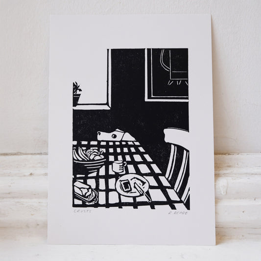 Black and white illustration of a table setting on with a dog eying up some leftovers