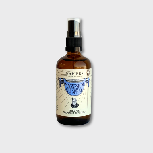 A bottle of Napiers Magnesium Oil Spray with a label showing information about the product.