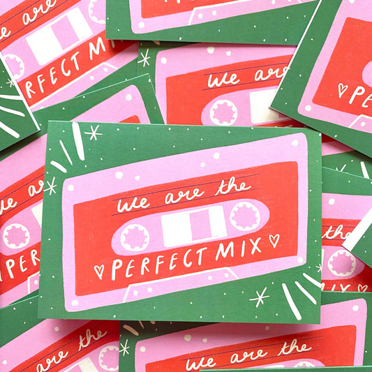 A collection of greetings cards with a retro mix tape design, featuring the text 'We're The Perfect Mix' and decorated with stars and hearts.