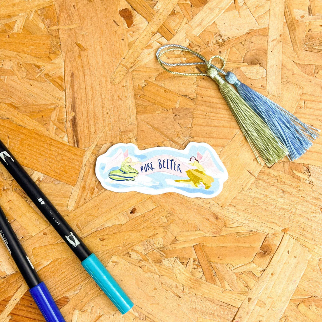 sticker of the scottish phrase 'pure belter' with angels surrounding it