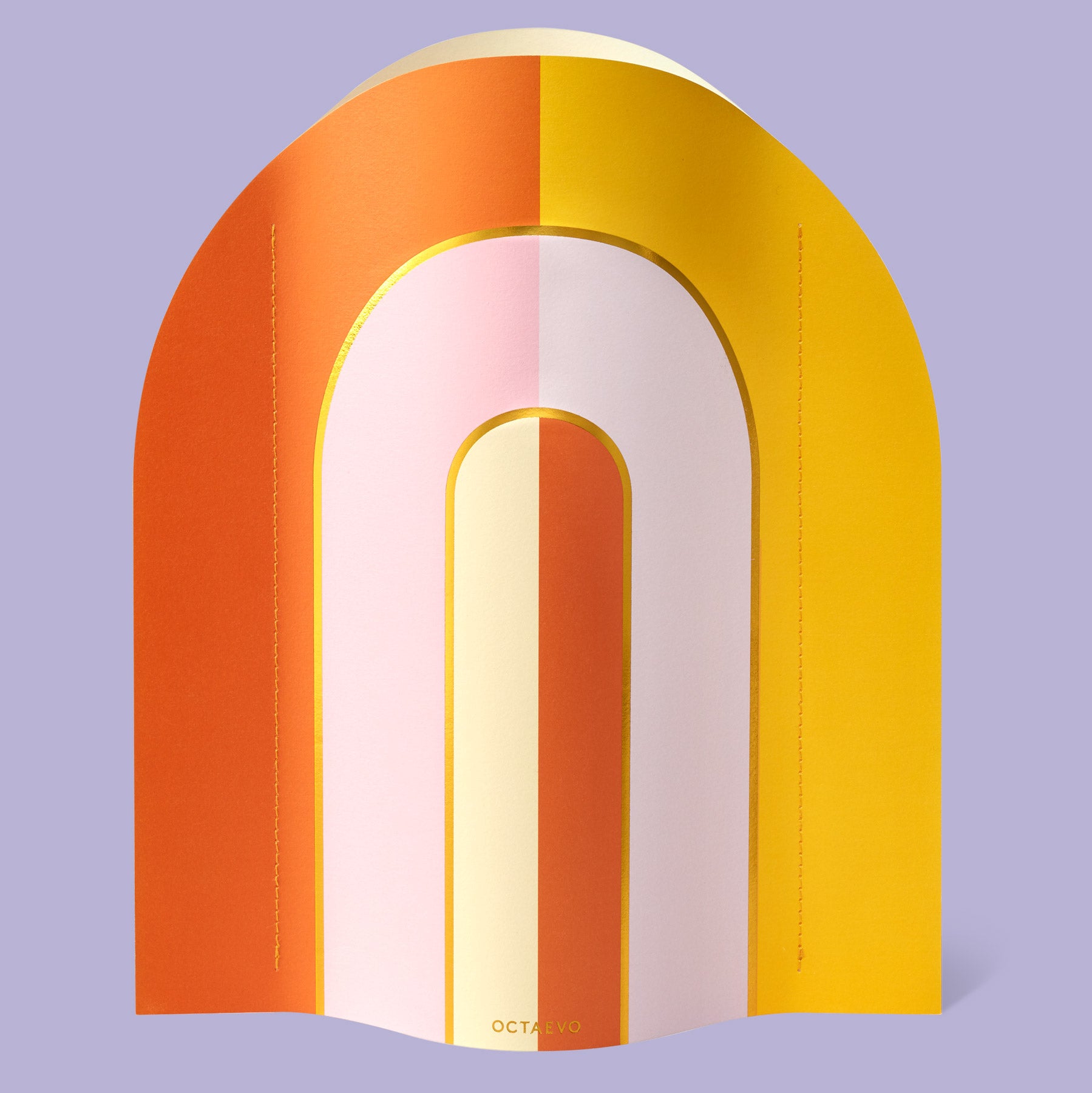 Colorful arch-shaped paper vase with a gradient of orange, pink, and yellow on a purple background