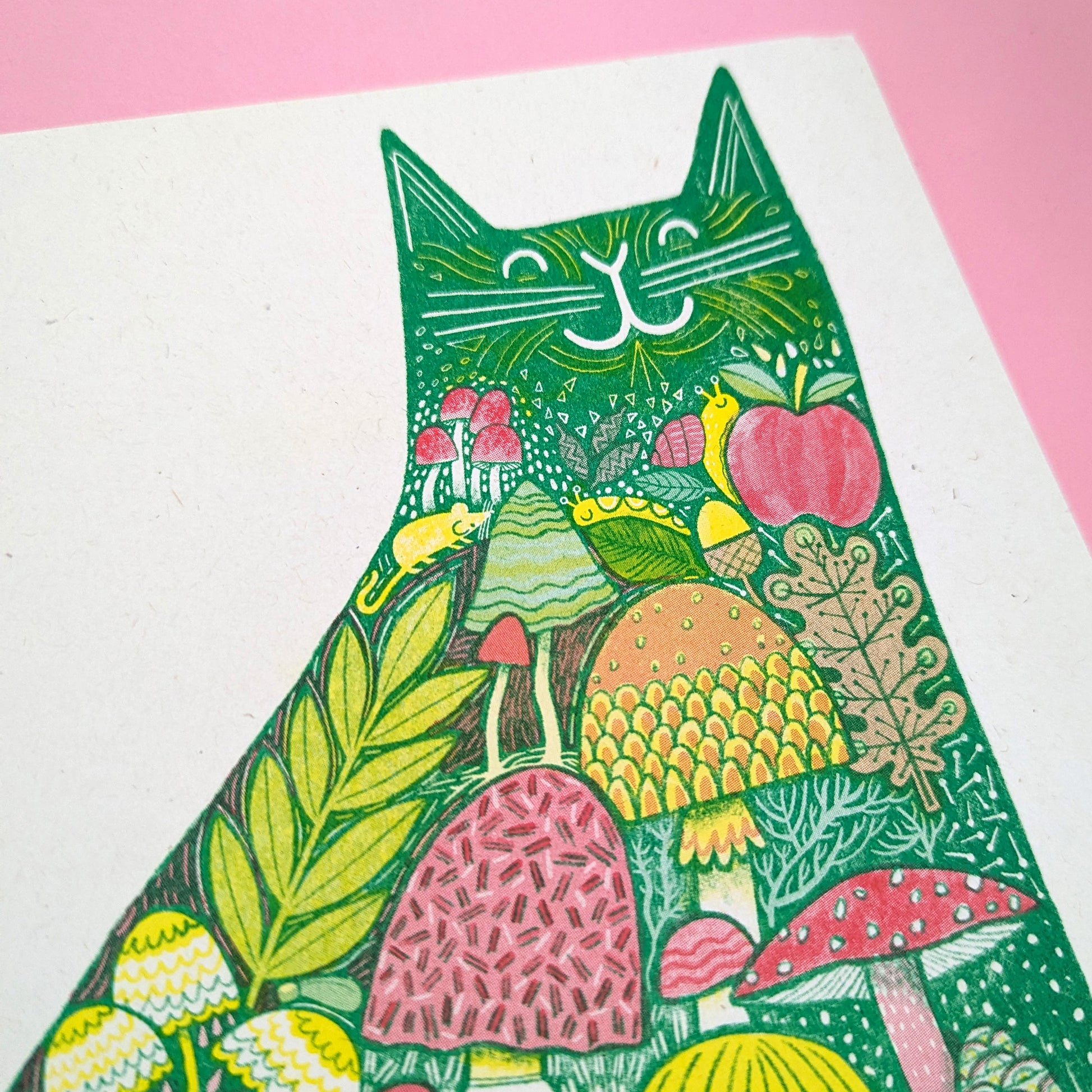 A colorful illustration of a cat with a woodland theme