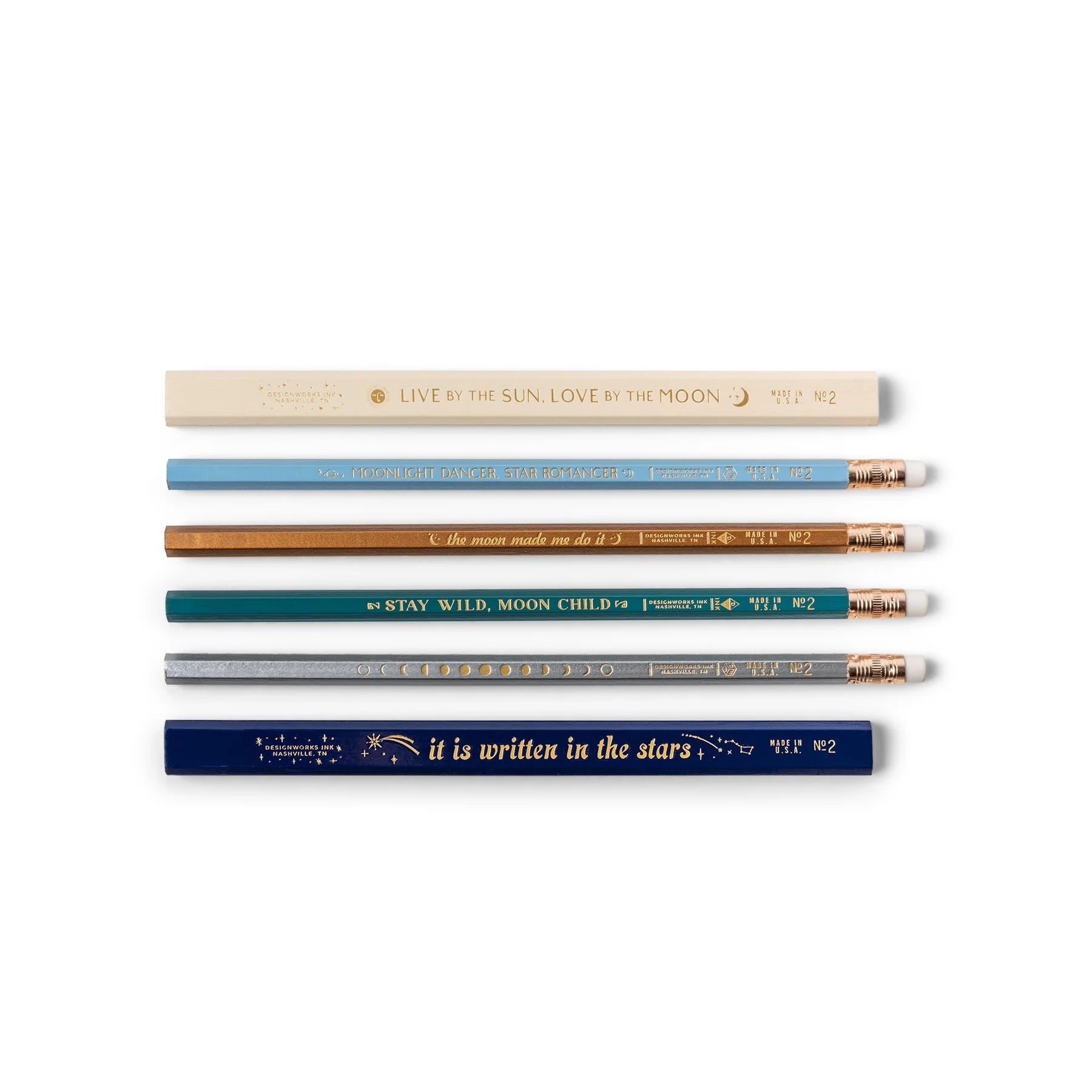 Gold embossed pencil collection with celestial themed slogans and imagery such as 'IT IS WRITTEN IN THE STARS"