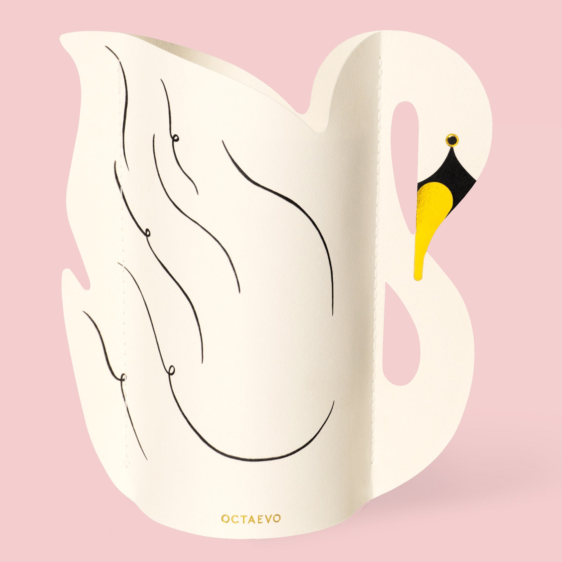 White swan paper vase on a pink background with 'OCTAEVO' branding.