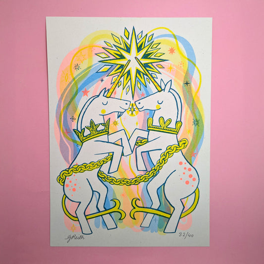 An A4 print featuring unicorns with a colorful background and a radiant star at the top.