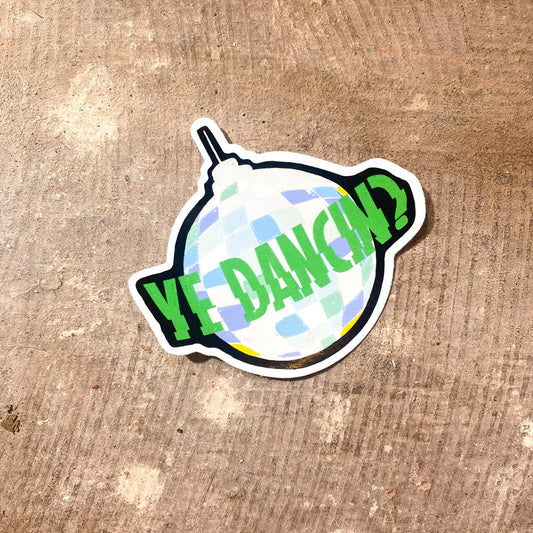 Sticker with 'YE DANCIN?' text on a textured surface